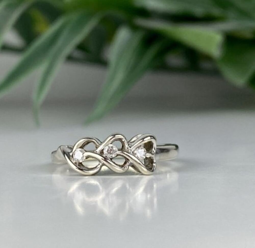 10K White Gold Diamonds "Hearts" Ring Size 7